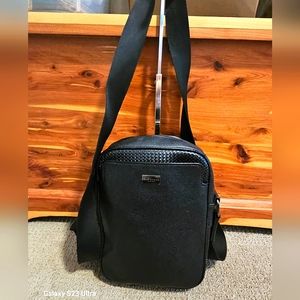 Ted Baker black camera crossbody bag.
